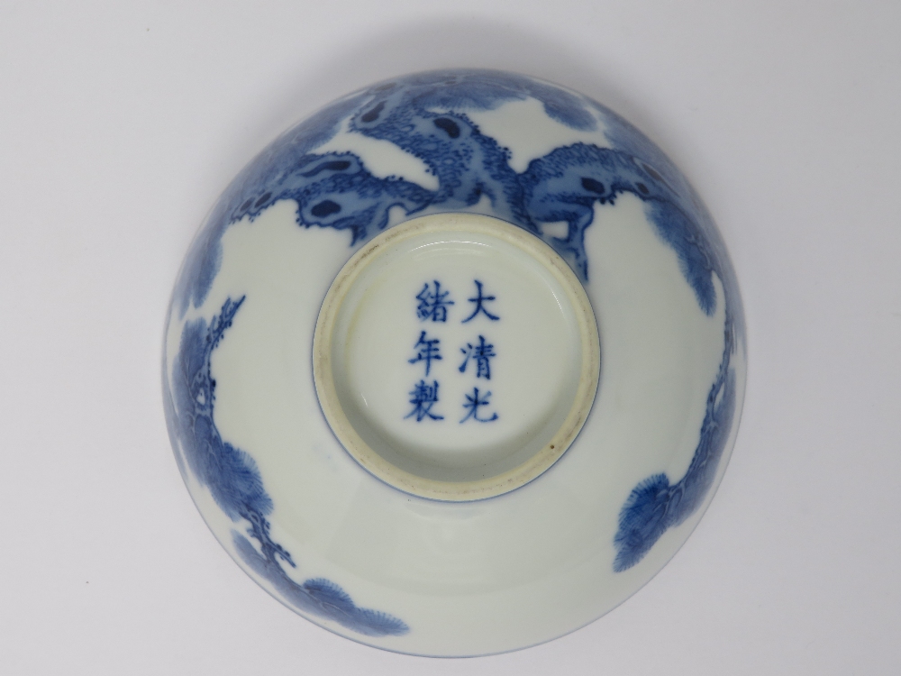 A CHINESE BLUE AND WHITE BOWL, GUANGXU MARK AND PERIOD (1875-1908) painted on the exterior with pine - Image 4 of 4