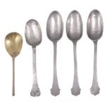 A PEWTER SPOON RACK AND FIVE SPOONS the rack probably Dutch, pierced and engraved backplate, with