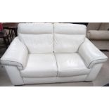 A cream leather 2 seater settee