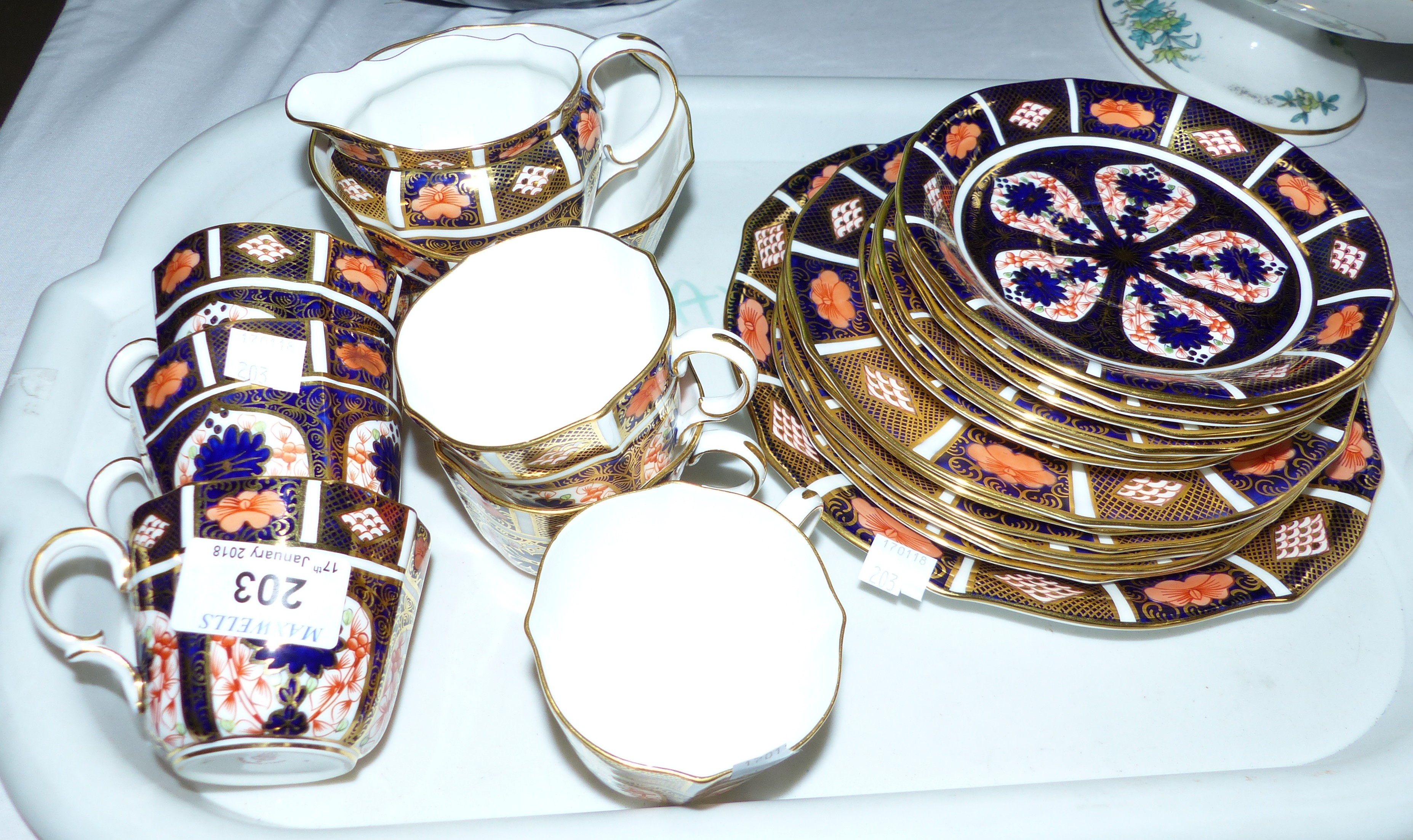 A Royal Crown Derby Japan pattern 21 piece tea set comprising 6 cups, saucers and plates, sugar