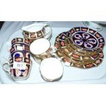 A Royal Crown Derby Japan pattern 21 piece tea set comprising 6 cups, saucers and plates, sugar