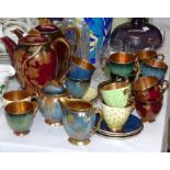 Two Carlton Ware coffee pots and a selection of various Carlton ware coffee cups saucers etc