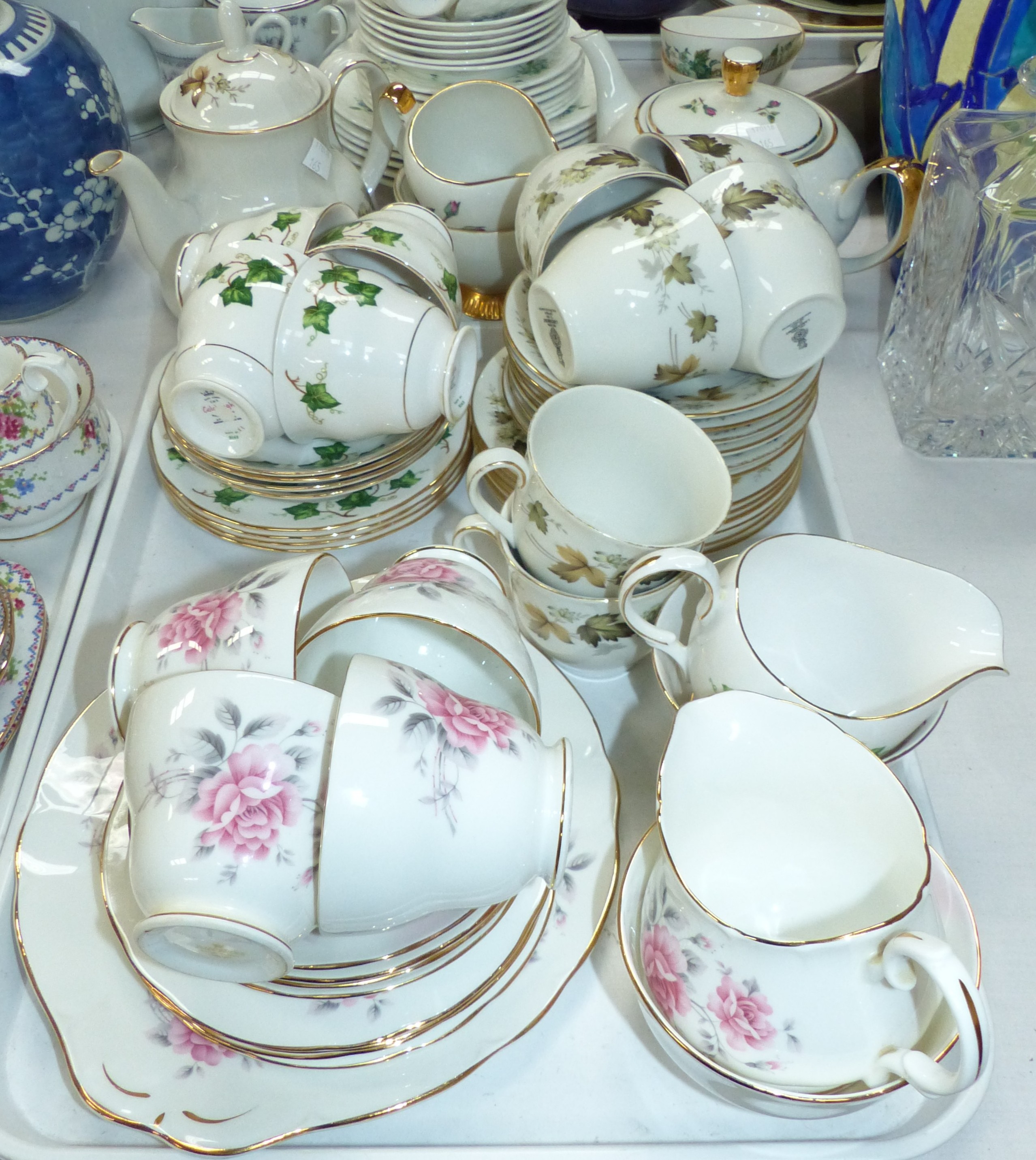 A Duchess bone china tea service; a Royal Doulton Larchmont similar with teapot; a continental