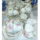 A Duchess bone china tea service; a Royal Doulton Larchmont similar with teapot; a continental