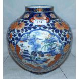 A large Imari porcelain vase decorated with alternating panels of flowers and landscape scenes, 16"