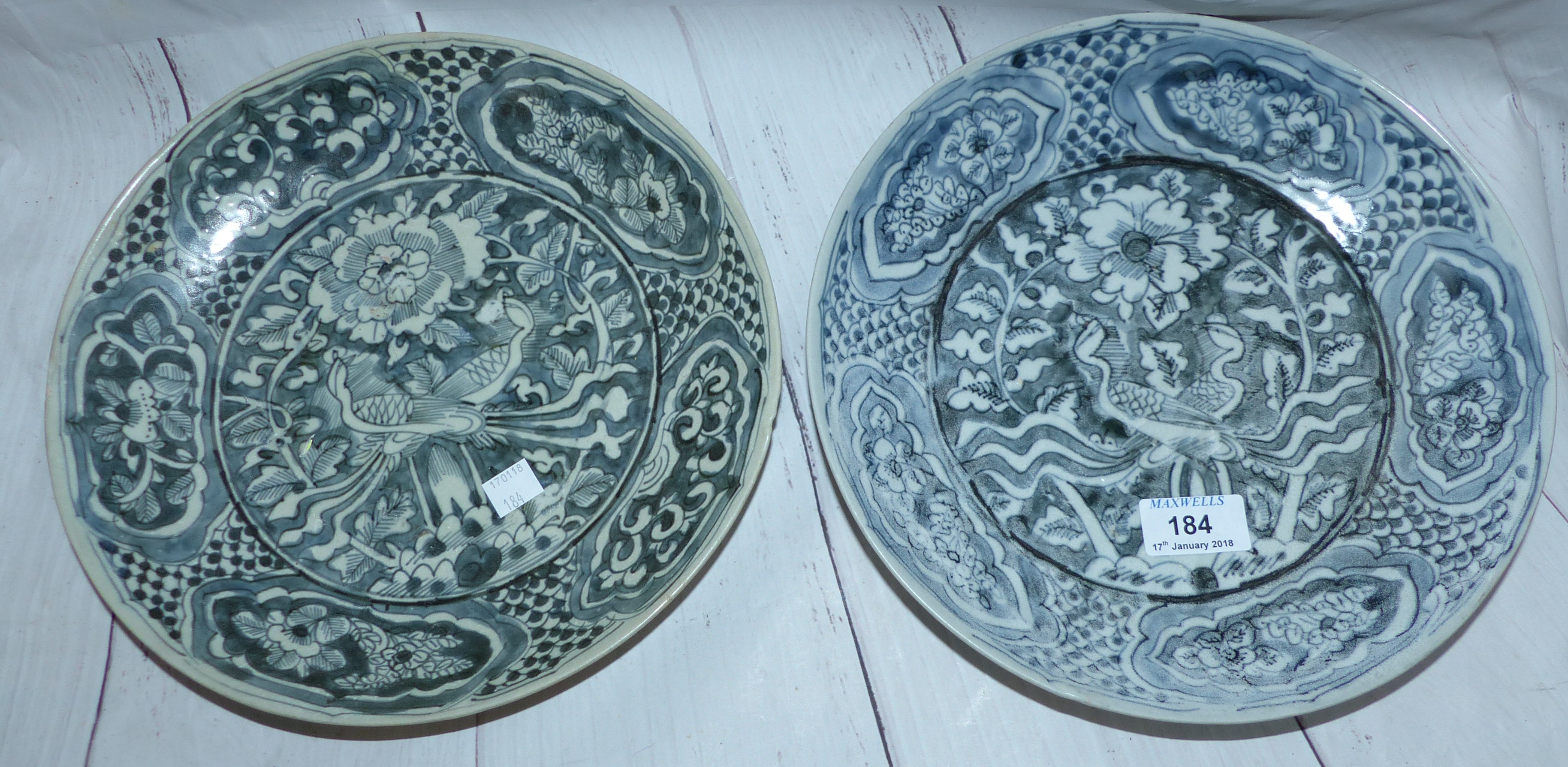 A pair of early 17th century Chinese blue and white circular dishes from the Binn Thun shipwreck,