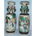 A pair of mid-20th century Chinese crackle glaze baluster vases decorated in polychrome with