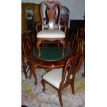 A period style walnut dining suite comprising oval extending table and 6 (4 + 2) chairs