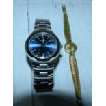 A gents Sekonda stainless steel wristwatch in original box; a ladies "Tudor" wristwatch on gold