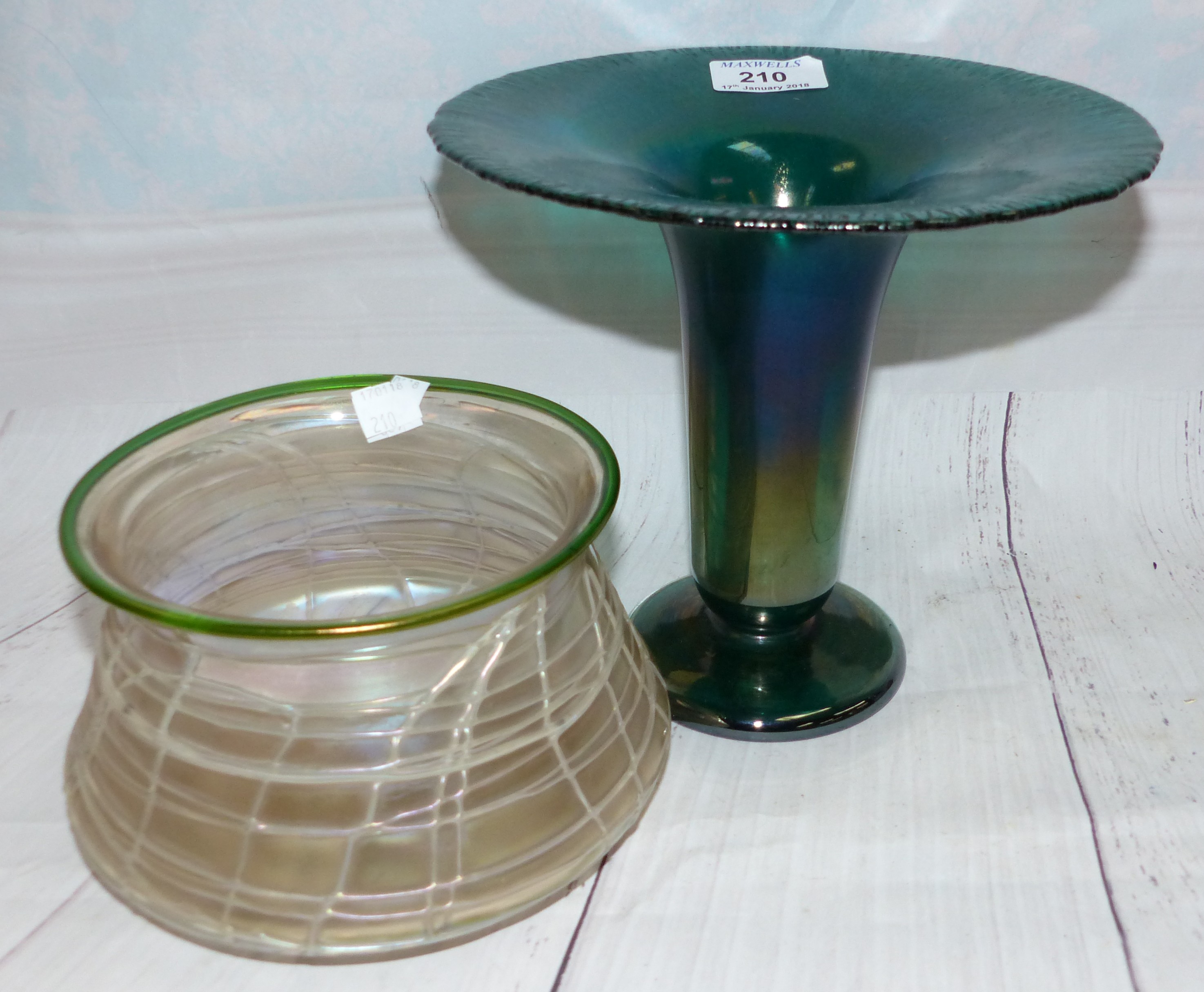 An Art Nouveau design iridescent glass bowl in the manner of Loetz, of circular waisted form with