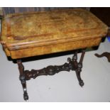 A Victorian inlaid walnut stretcher occasional table with turnover baize lined top, 30"