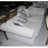 A 3 seater settee in oatmeal upholstery