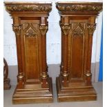 A pair of Gothic carved oak and parcel gilt plinths, 36"