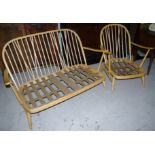 An Ercol light elm 2 seater settee and similar armchair with stick backs