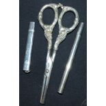 A pair of steel and white metal grape scissors, handles stamped 'STERLING'; a Wincarnis