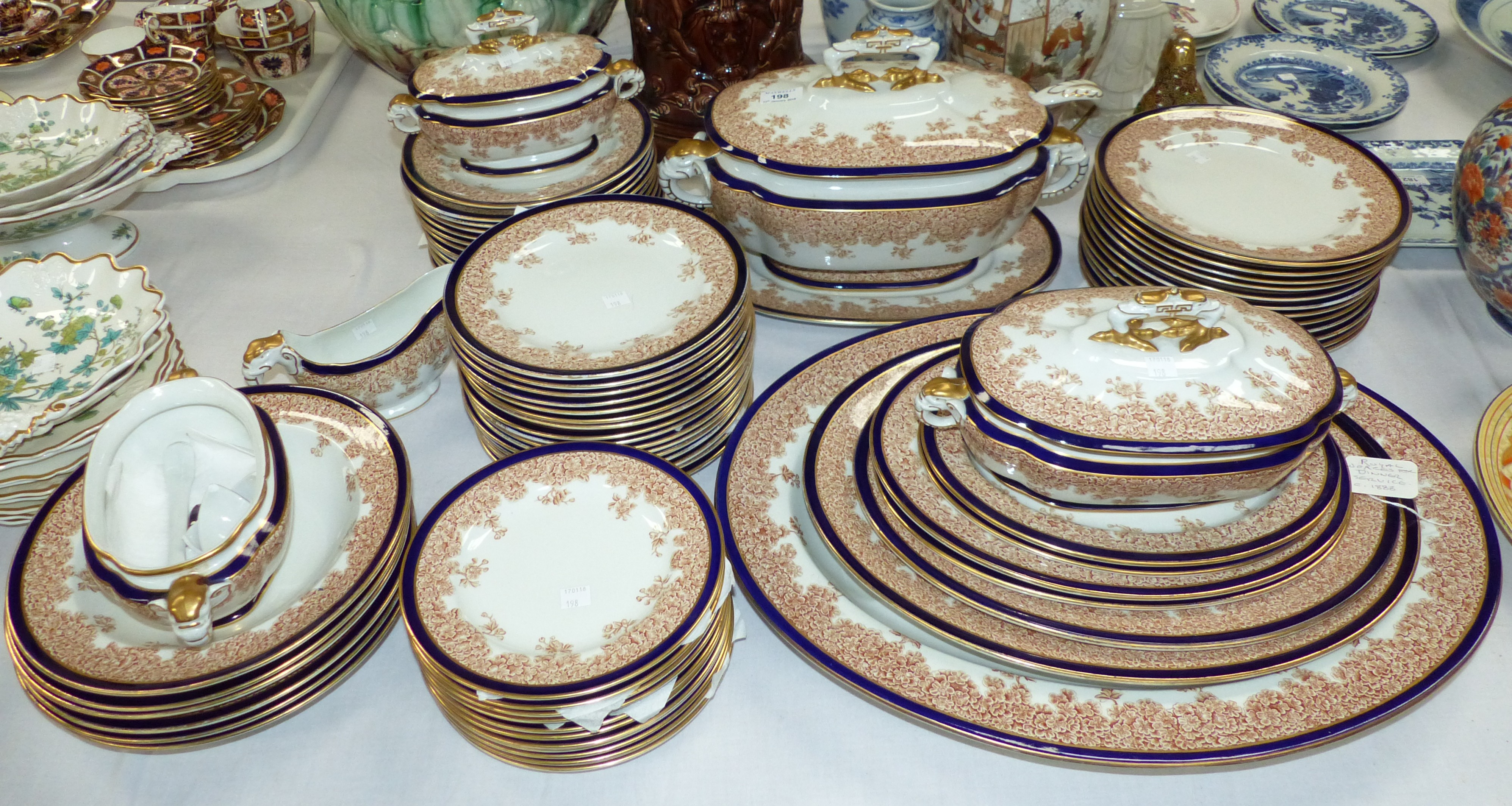 A 19th century Worcester stoneware dinner service to include large tureen with ladle, oval tree meat