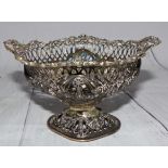 A silver rococo style pedestal sweetmeat basket (no liner), London, Mappin & Webb, 1908, 5 oz.
