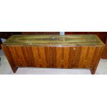 A 1970's rosewood sideboard with 4 doors and chrome trim, matching the previous Lot, length 72"