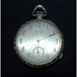 A gents Waltham pocket watch in ornate white metal case with chased decoration, stamped '14K'