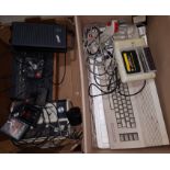 An Atari Video Computer System, a Comadore 64 system, tapes etc (not guaranteed working)