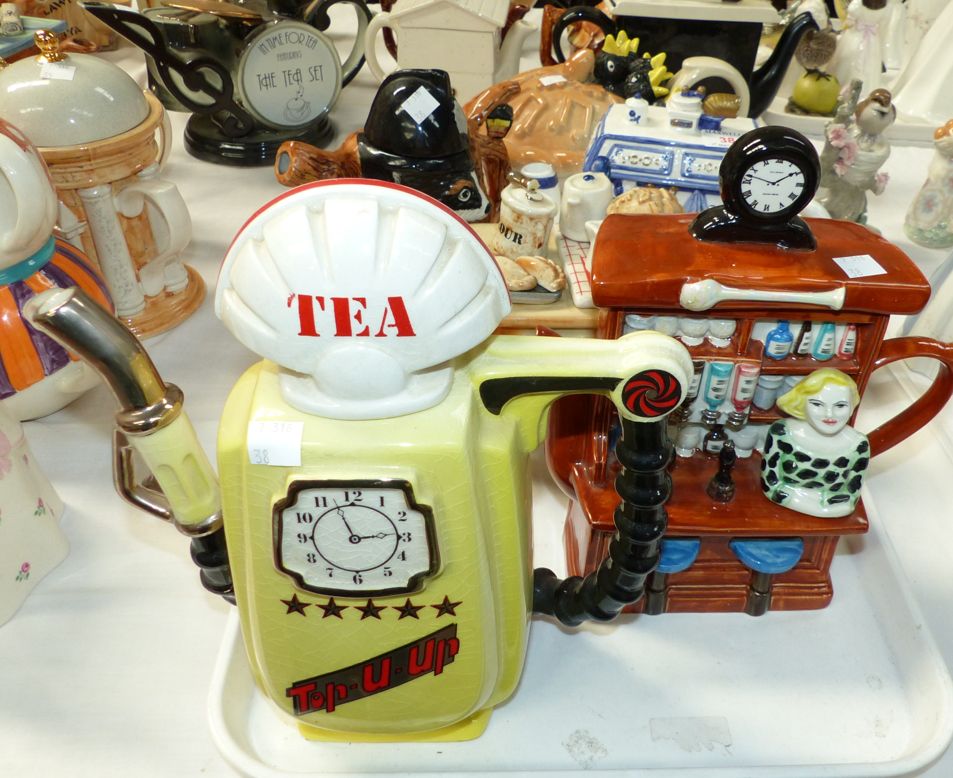 6 Novelty Teapots:- Kitchen Range, Badger Policeman, Shell Petrol, 24 Blackbirds, Bar & Stools,