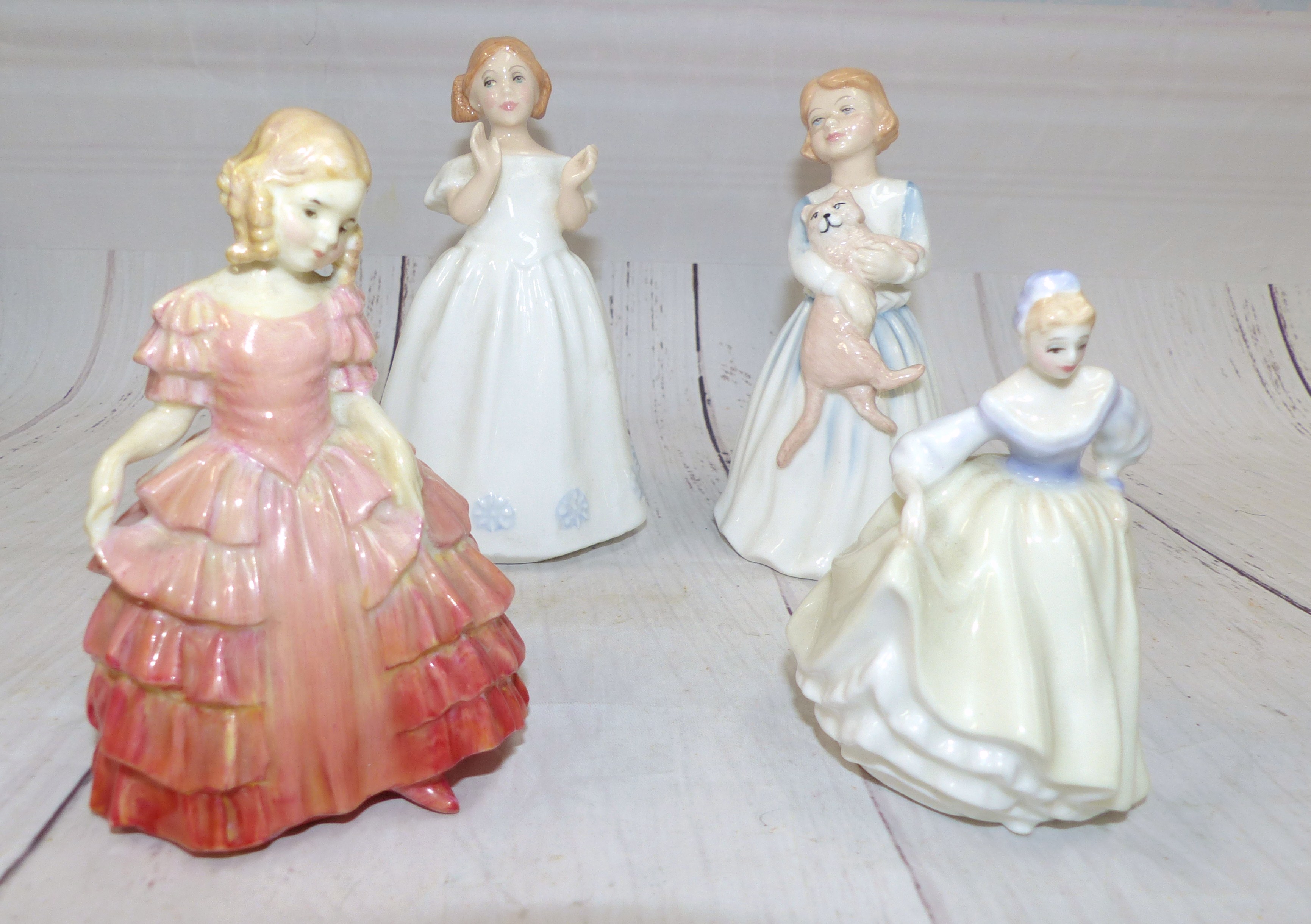 Royal Doulton figures ''Rose'' HN1368 hand painted marks to base; ''Catherine'' HN3044; ''Fairlady''