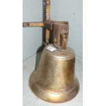 A large brass ship's bell on steel wall bracket height 10''