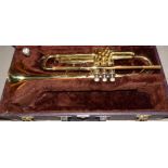 A cased student trumpet