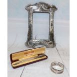 A silver Yard-O-Led pencil, cased, a silver photo frame and a napkin ring