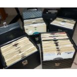 A selection of various rock and pop singles in six carry cases