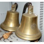 2 brass ships bells with makers seal mark numbered 1839 on steel wall brackets height 81/2''