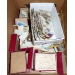 A selection of various boxed slides and cigarette cards