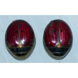 A pair of enamelled ladybird snuff boxes 1.5"