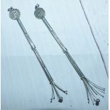 A pair of oriental white metal swizzle sticks marked 925