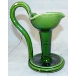 A 19th century green glazed chamberstick in the manner of Christopher Dresser 6.5"