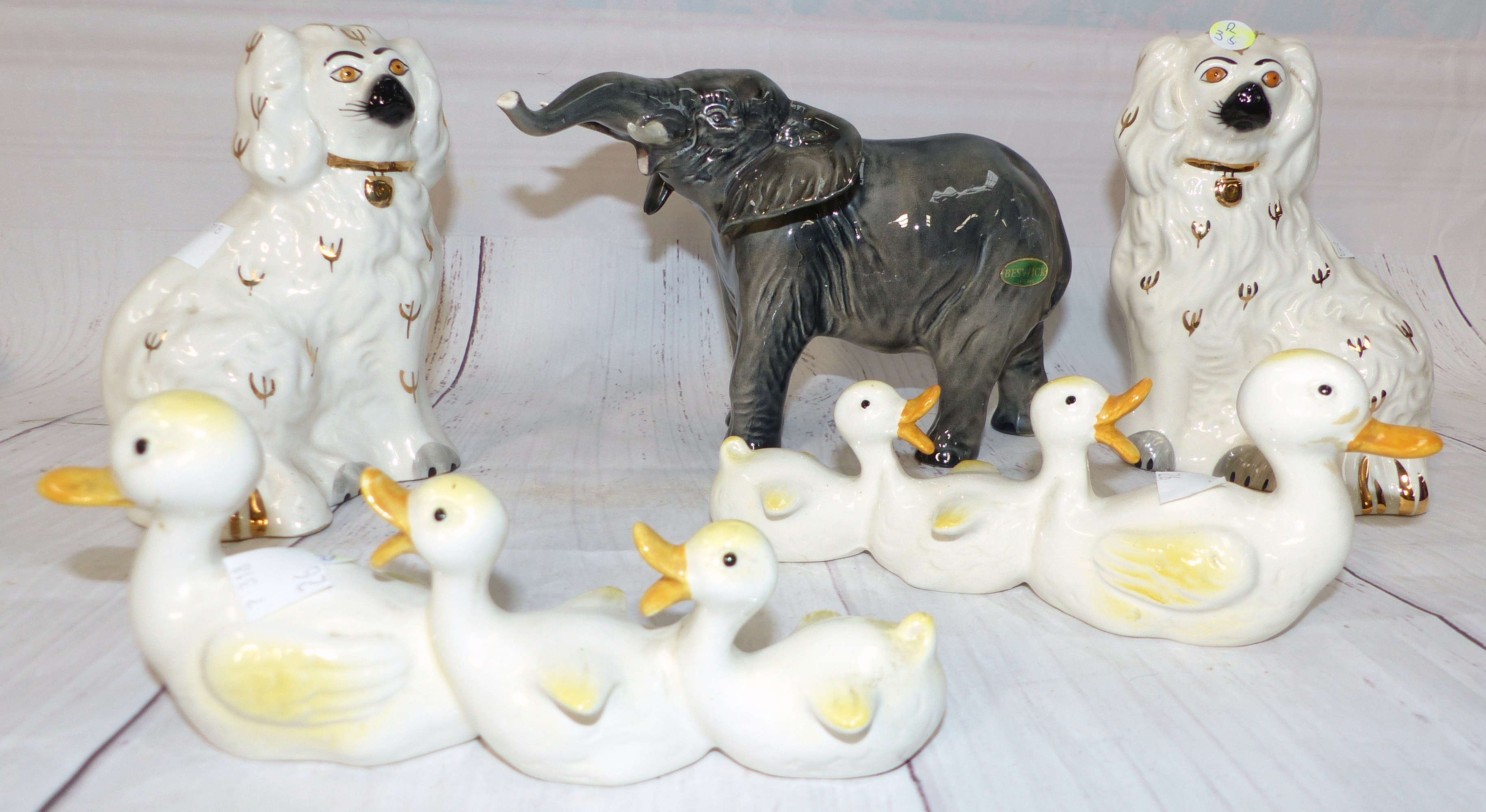 A Beswick elephant, a pair of Beswick King Charles Spaniels, 2 Beswick duck groups