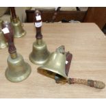 2 ARP brass hand bells and an A.R.P. wall mounted bell