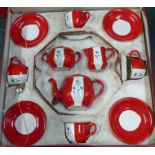 An enamel boxed children's tea set