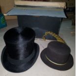 A top hat with box and a childs top hat with feather