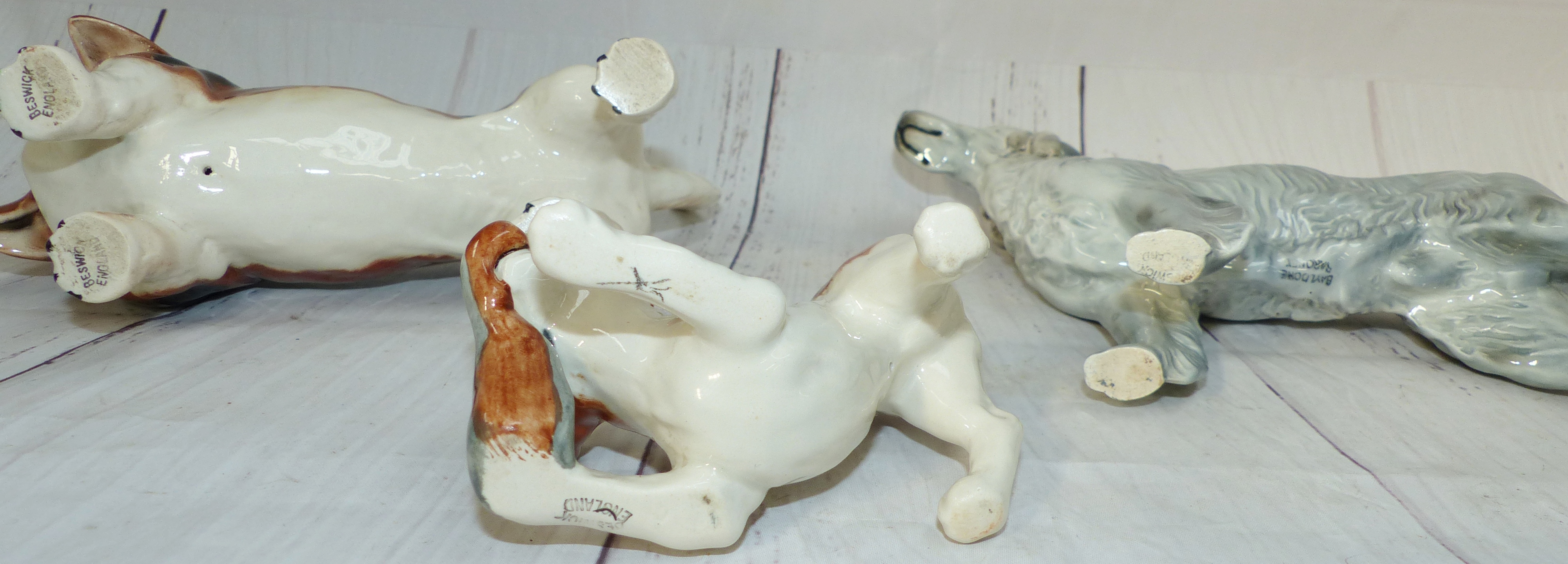 A Beswick china figure of a Basset Hound, a similar figure Bayldone Baronet (tail repaired), another - Image 2 of 3