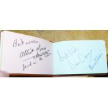 An autograph album with Coronation Street star signatures