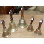 5 various graduating brass hand bells