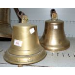 2 brass ships bells 1 with floral border with steel brackets height 8''