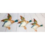 A set of three graduating Beswick wall ducks (smallest wing is repaired)