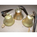 A brass ships bell lettered ''Winkworth''; 2 others all on steel brackets heights 6'' & 61/2''