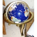 A globe with inset semi precious stones and a gilt metal gimbal mount 13" diameter
