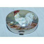 A silver oval patch box with hand enameled top depicting a Cockerel