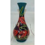 Moorcroft - vase with stylised red flowers on purple background hand painted marks to base 2008 61/