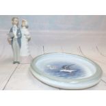 A Lladro group of a bride and groom and a Royal Copenhagen dish decorated with seagulls