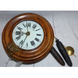 A 19th century Black Forrest postman's alarm wall clock with weights and pendulum